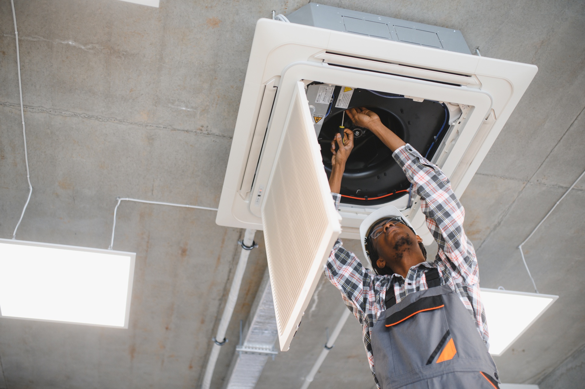african-american-technician-repairing-air-conditio-2025-08-26-14-21-33-utc 1
